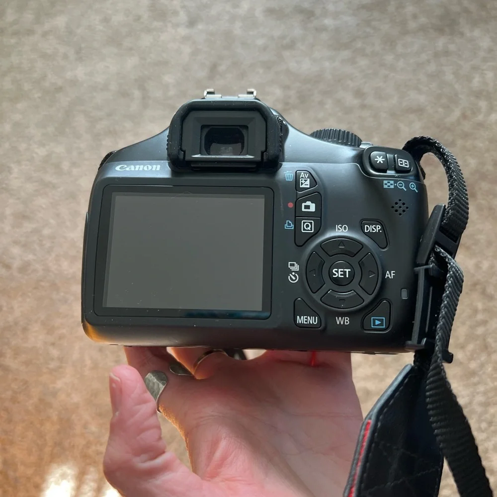 Cannon EOS 1100D camera with a 18-55 mm lens